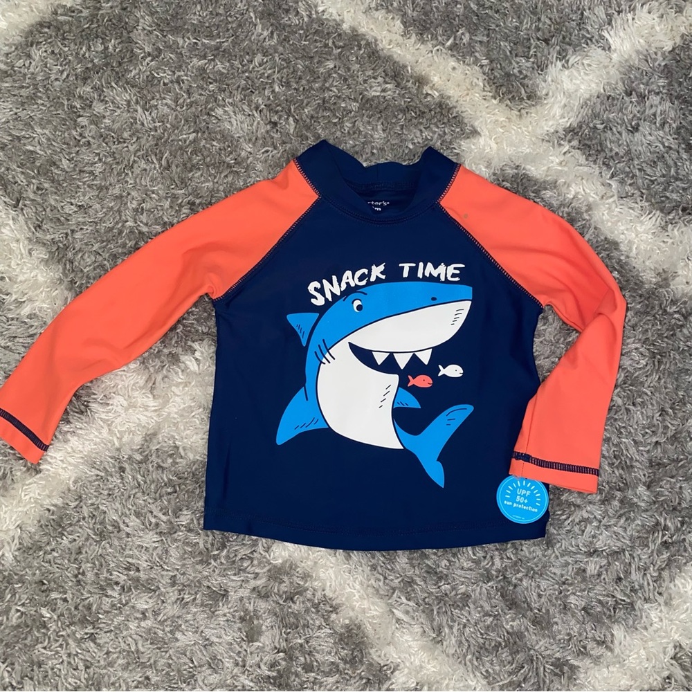 Boys swim top.